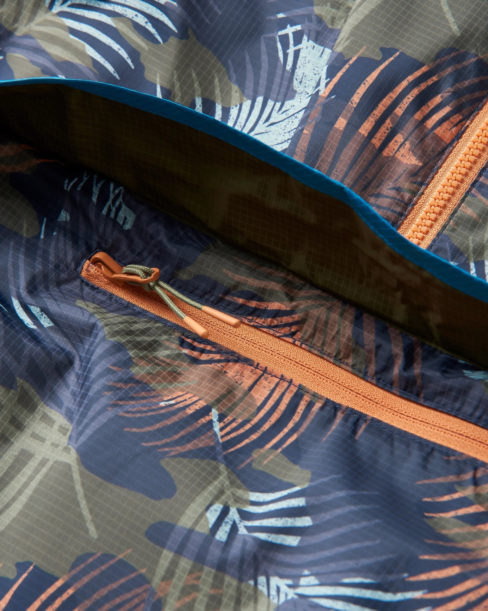 Gusto Recycled Windshell Anorak - Palm Camo Apricot - Flatlay