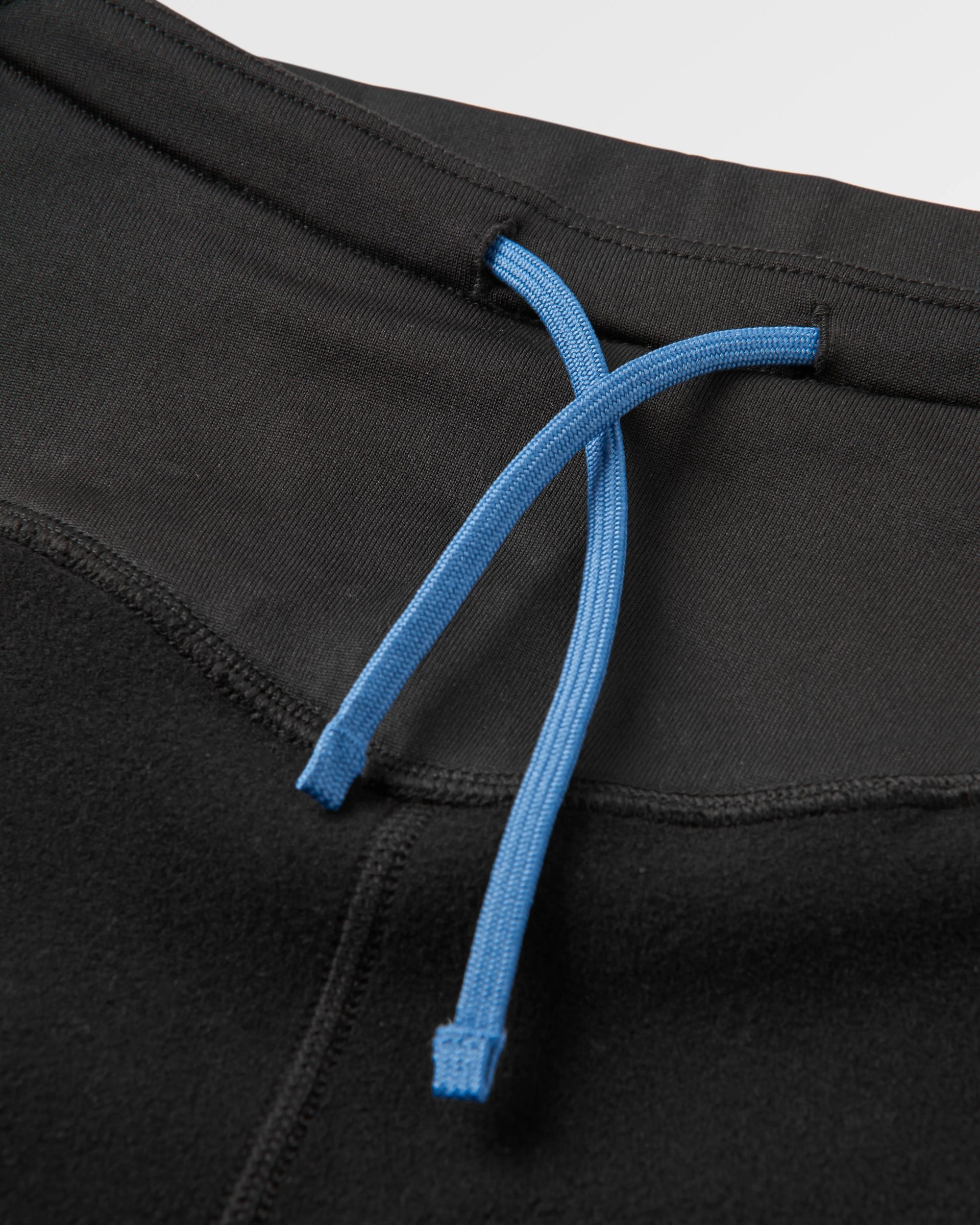 Solitude Recycled Polartec® Legging - Black - Flatlay