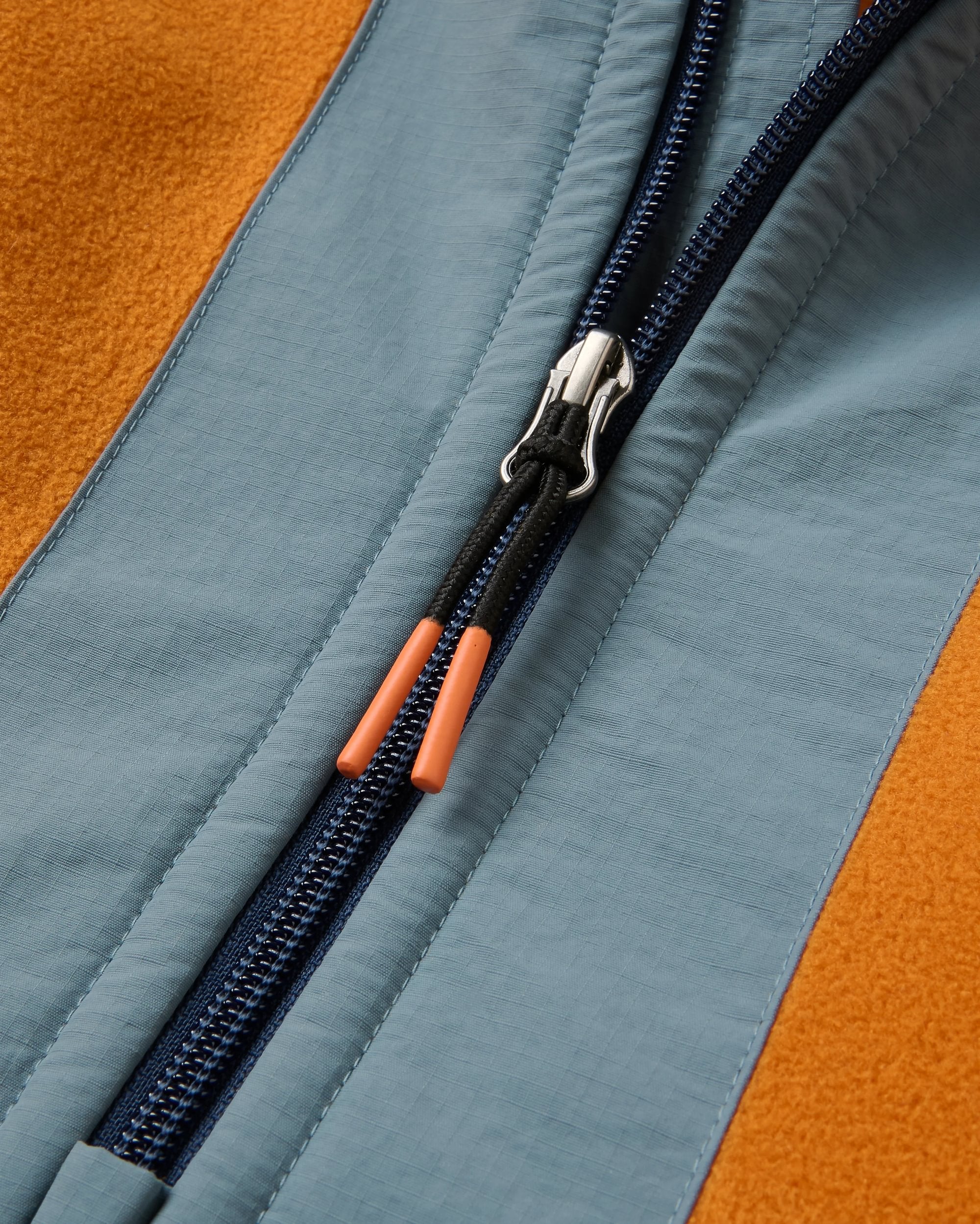 Woodland Hooded 1/2 Zip Recycled Polartec® Fleece - Retro Orange/Tidal Blue - Flatlay