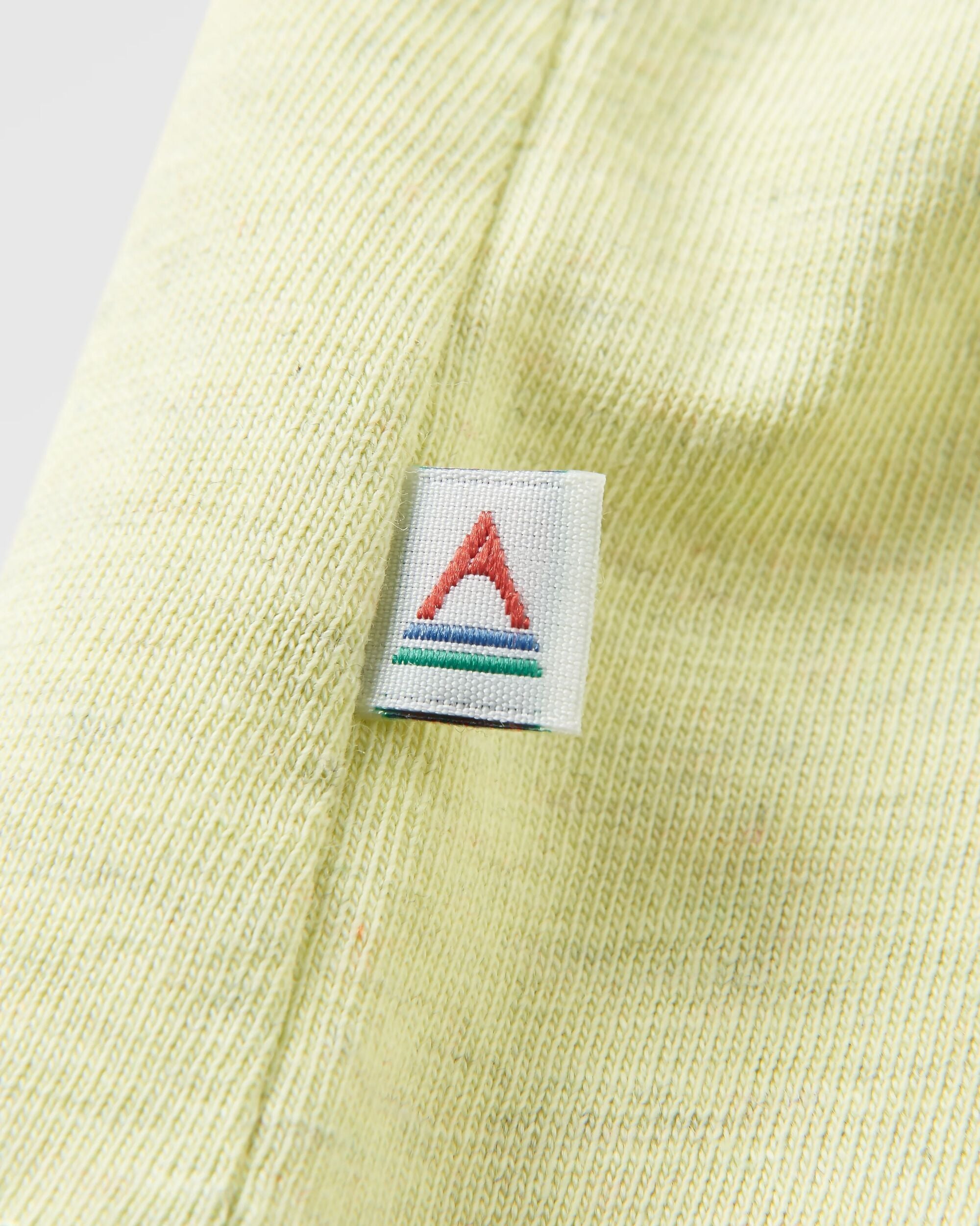 Sunburst Organic Vest - Soft Lime Juice - Flatlay